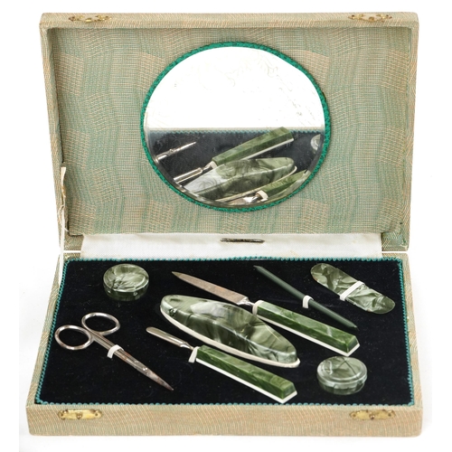 1371 - Sundry items comprising vintage manicure set, two Japanese lighters in the form of cameras and an In... 