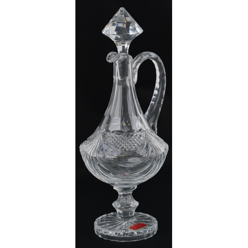 1384 - Crystal claret jug and box, 42cm high