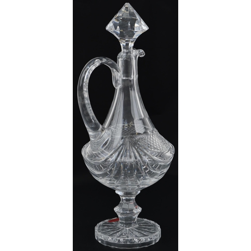 1384 - Crystal claret jug and box, 42cm high