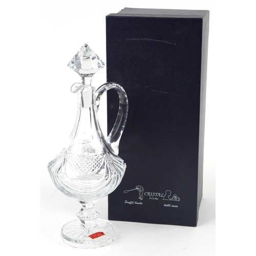 1384 - Crystal claret jug and box, 42cm high