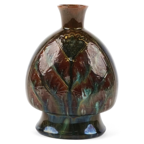 Christopher Dresser for Linthorpe, Arts and crafts vase having a brown and green mottled glaze incised with stylised leaves, numbered 334 to the base, 18cm high