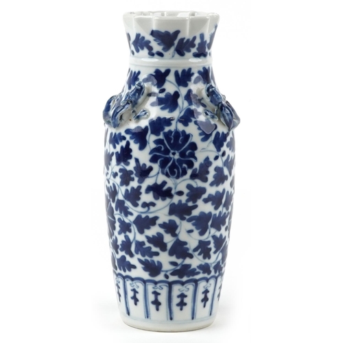 163 - Chinese blue and white porcelain vase decorated in relief with two dragons hand painted with flowers... 