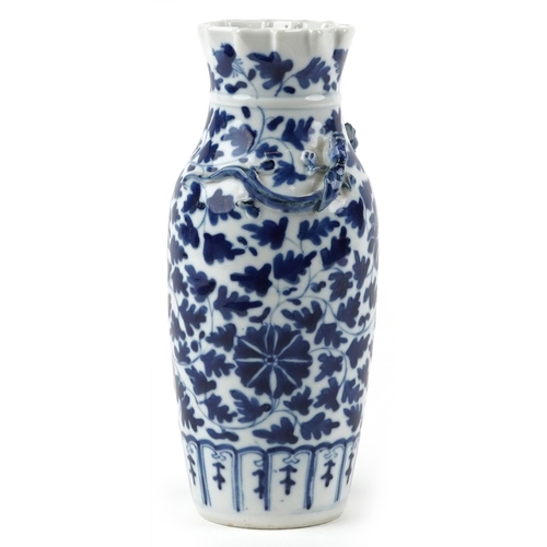 163 - Chinese blue and white porcelain vase decorated in relief with two dragons hand painted with flowers... 