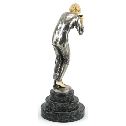 351 - After Victor Seifert, Art Deco style silvered and ivorine statuette of a thirsty young female raised... 