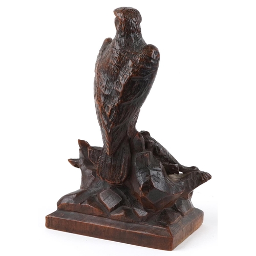 93 - German Black Forest carving of an eagle with it's catch, 22.5cm high