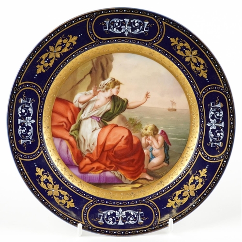 Royal Vienna, 19th century Austrian porcelain cabinet plate hand painted with Ariadne and Putti beside water within a gilt and pâte-sur-pâte type blue ground border, 20.5cm in diameter