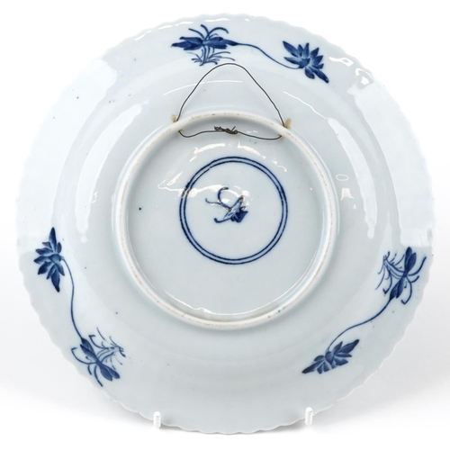 1341 - Chinese blue and white porcelain plate decorated with flowers, 23cm in diameter