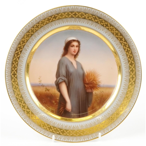 Royal Vienna, 19th century Austrian porcelain cabinet plate hand painted with a portrait of Ruth within a gilt foliate border, 24cm in diameter