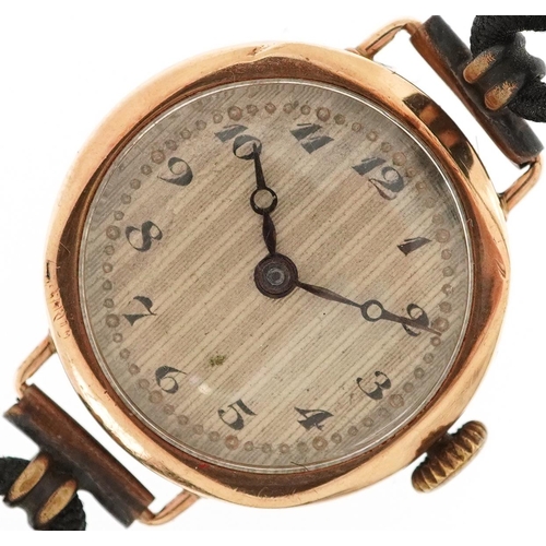 2468 - Talis, ladies 9ct gold manual wind wristwatch having silvered dial with Arabic numerals, the case 25... 