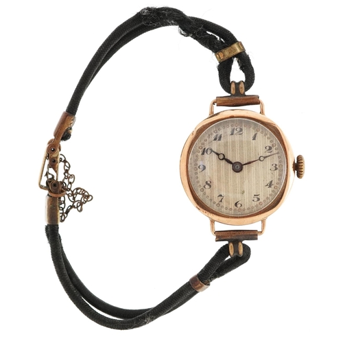 2468 - Talis, ladies 9ct gold manual wind wristwatch having silvered dial with Arabic numerals, the case 25... 