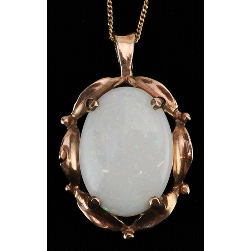 2146 - 9ct gold cabochon opal pendant on a 9ct gold necklace, 2.3cm high and 47cm in length, 2.4g