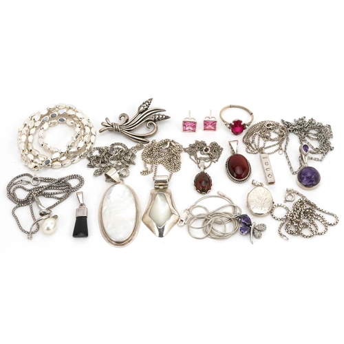 2729 - Silver jewellery, some set with semi precious stones, including floral engraved locket, pendants on ... 