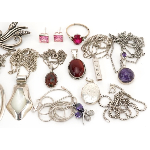 2729 - Silver jewellery, some set with semi precious stones, including floral engraved locket, pendants on ... 