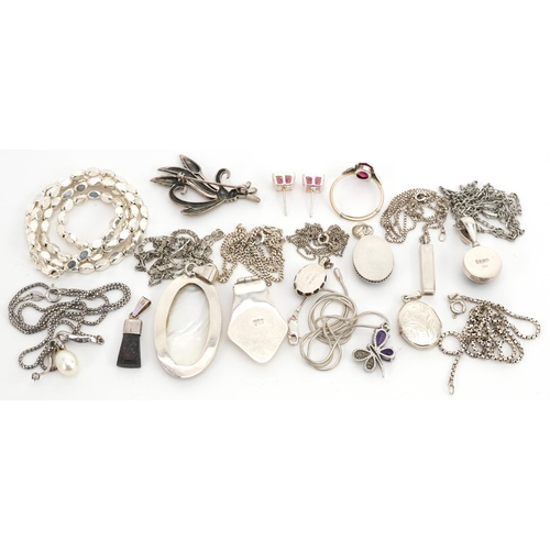 2729 - Silver jewellery, some set with semi precious stones, including floral engraved locket, pendants on ... 