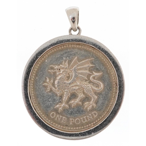 2473 - 1995 Elizabeth II silver Welsh dragon one pound coin housed in an unmarked white gold pendant mount ... 