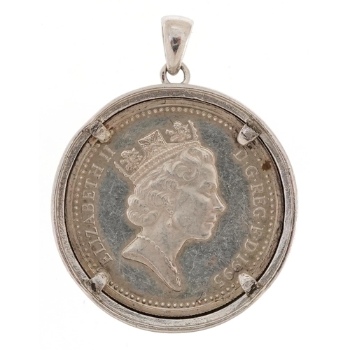 2473 - 1995 Elizabeth II silver Welsh dragon one pound coin housed in an unmarked white gold pendant mount ... 