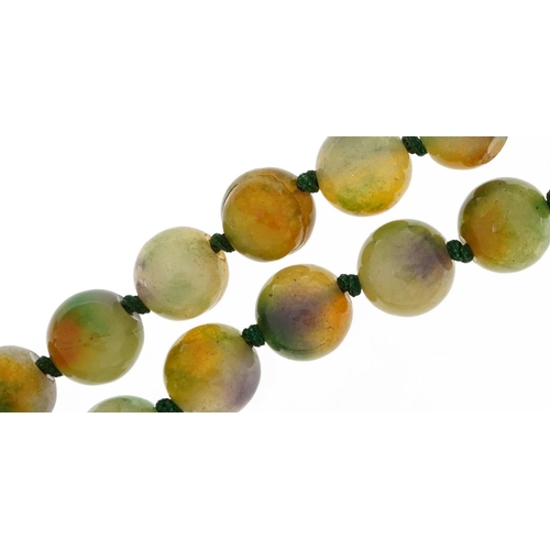 2134 - Polished fluorite bead necklace, each bead 12.5mm in diameter, overall 84cm in length, 170.0g