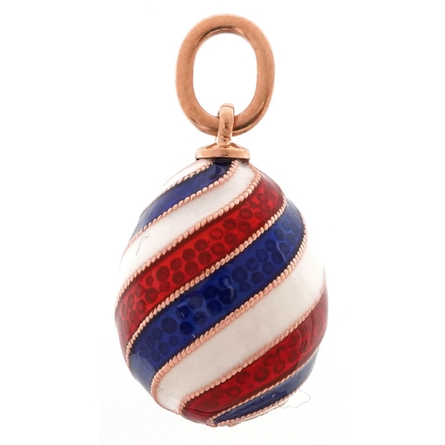 2496 - 14ct gold red, white and blue enamel egg pendant, impressed Russian marks to the suspension loop, 2.... 