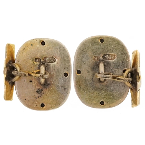 2526 - Pair of silver gilt and blue enamel portrait cufflinks set with red stones, impressed Russian marks,... 