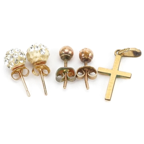 2529 - Two pairs of 9ct gold ball stud earrings and a yellow metal cross pendant, one pair set with clear s... 