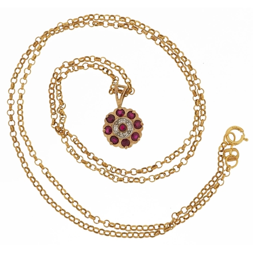 2164 - 9ct gold diamond and ruby flower head pendant on a 9K gold necklace, 1.6cm high and 52cm in length, ... 