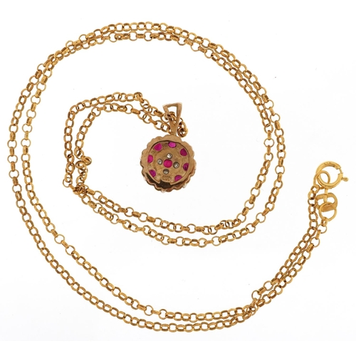 2164 - 9ct gold diamond and ruby flower head pendant on a 9K gold necklace, 1.6cm high and 52cm in length, ... 