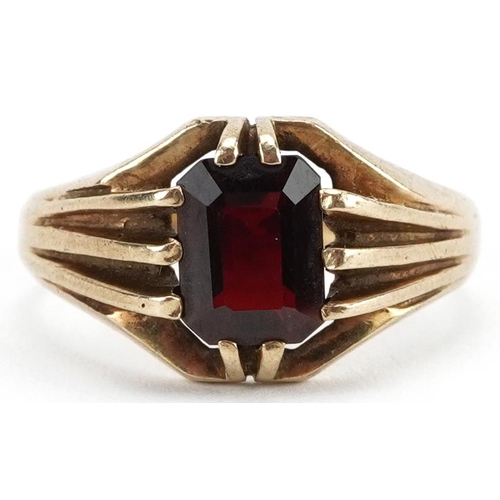 2510 - 9ct gold garnet ring, the garnet approximately 8.80mm x 6.40mm x 4.0mm deep, size V/W, 5.4g