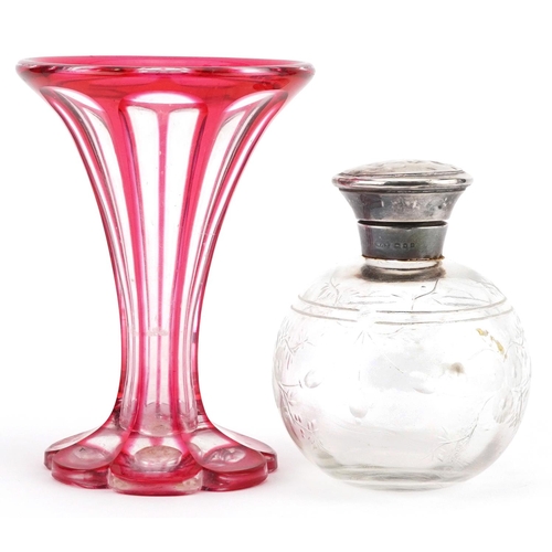 129 - Bohemian ruby flashed cut glass vase and a silver topped scent bottle acid etched with flowers, 14.5... 