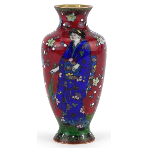 84 - Japanese cloisonne vase enamelled with a Geisha in a landscape with flowers, 13.5cm high