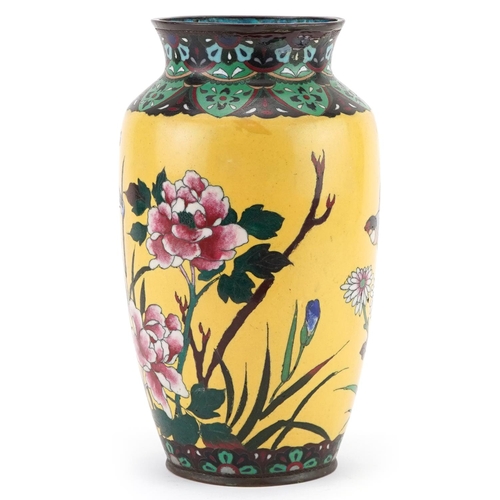 169 - Japanese yellow ground cloisonne vase enamelled with a bird amongst flowers, 24.5cm high