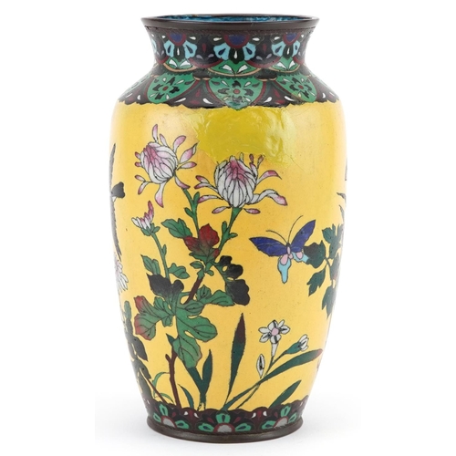 169 - Japanese yellow ground cloisonne vase enamelled with a bird amongst flowers, 24.5cm high