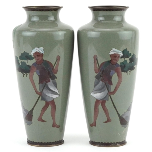 82 - Pair of Japanese cloisonne vases, each enamelled with a man sweeping, each 19cm high