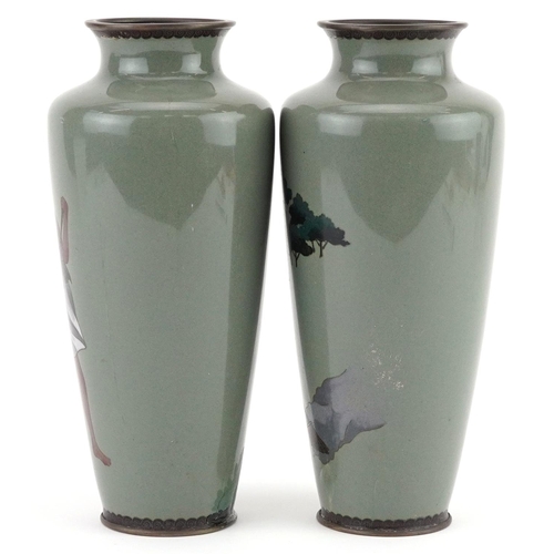 82 - Pair of Japanese cloisonne vases, each enamelled with a man sweeping, each 19cm high