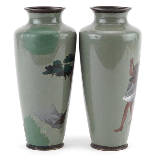 82 - Pair of Japanese cloisonne vases, each enamelled with a man sweeping, each 19cm high