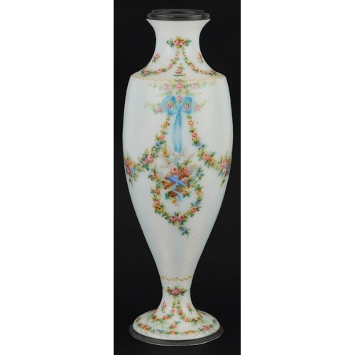 19th century French silver and white guilloche enamel vase finely hand painted with swags, ribbons and instruments, impressed 
eagle's head to the base, 21cm high, 253g