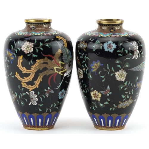 21 - Pair of Japanese cloisonne vases, each enamelled with a mythical bird amongst flowers, each 9cm high