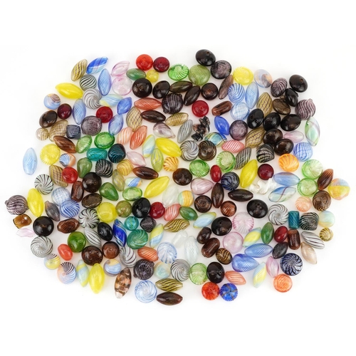 2790 - Large collection of Italian colourful swirl glass beads, the largest approximately 2.8cm in length