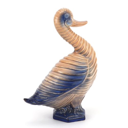 110 - Carlton Ware, Art Deco ribbed duck having a peach and blue glaze, 21.5cm high