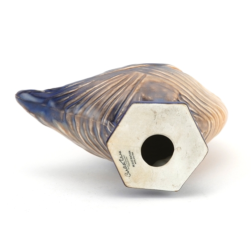 110 - Carlton Ware, Art Deco ribbed duck having a peach and blue glaze, 21.5cm high