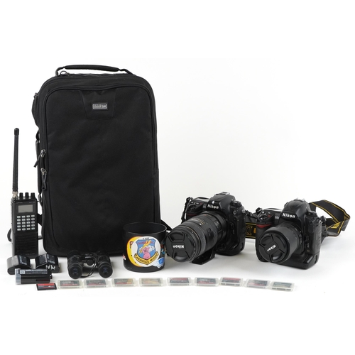 1244 - Two Nikon cameras with accessories comprising Nikon D3X with 80-105mm DX lens and Nikon D2X with 80-... 