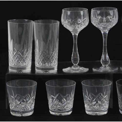 1186 - Stuart crystal glassware including two drinking glasses, set of six water glasses and decanter, the ... 