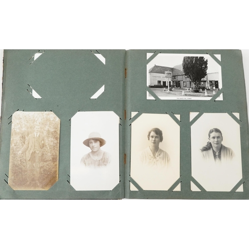 1731 - Early 20th century and later postcards arranged in an album, some real photographic, including Hampt... 