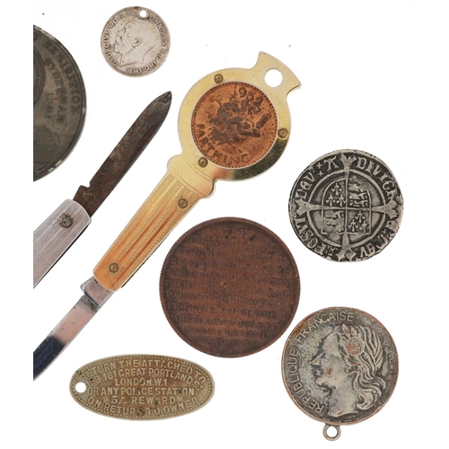 1700 - Coins and medallions including two Penny-Farthing folding pocket knives and an Earls Court Gigantic ... 