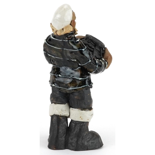 1375 - Studio pottery figure of a fisherman, 14cm