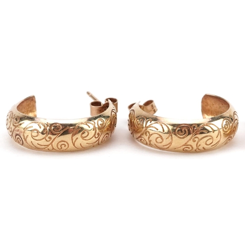 2133 - Two pairs of 9ct gold hoop earrings, one pair with floral engraved decoration, the largest 1.9cm in ... 