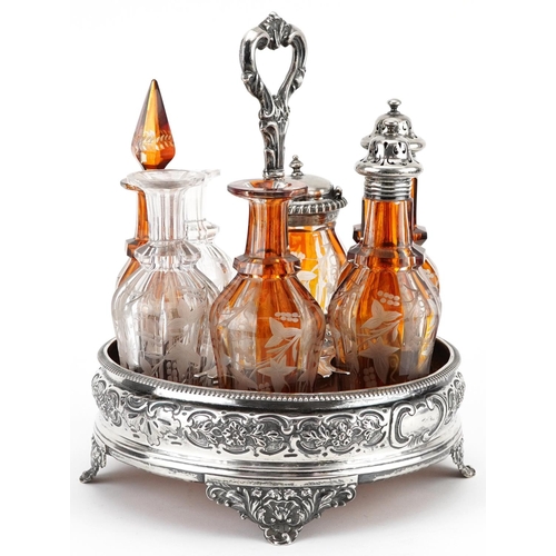 132 - William Evans, Victorian silver six bottle cruet stand with six cut glass bottles including four Boh... 