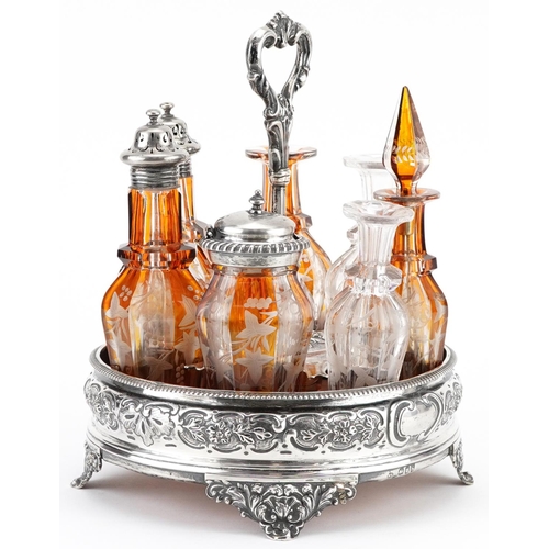 132 - William Evans, Victorian silver six bottle cruet stand with six cut glass bottles including four Boh... 