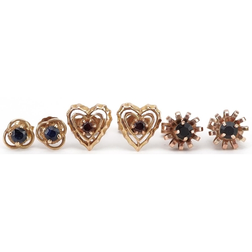 2648 - Three pairs of 9ct gold sapphire and garnet stud earrings including love heart examples, the largest... 