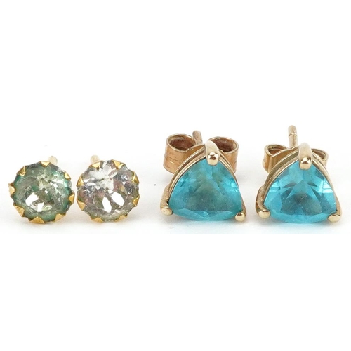 2435 - Two pairs of 9ct gold stud earrings including a pair set with blue topaz, the largest 6.5mm high, to... 