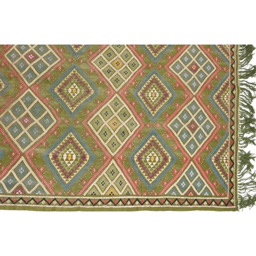 1107 - Rectangular Turkish Kilim green ground rug, 250cm x 155cm